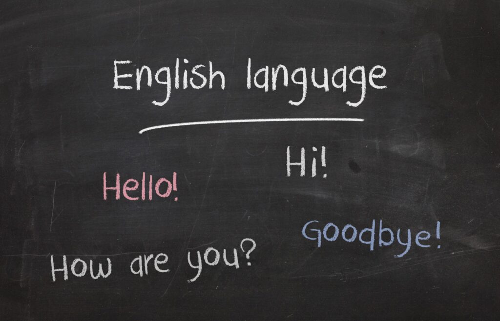 Tabule se slovíčky: Hello!, Hi!, How are you?, Goodbye!, English language